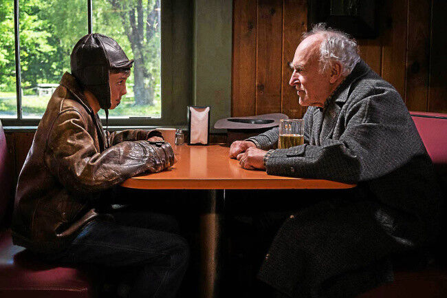 Two actors perform a scene